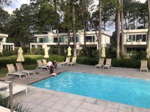 Πισίνα στο ή κοντά στο Garden View 2 Dormitorios con Jardín y Parrillero hasta 7 personas +14 φωτογραφίες