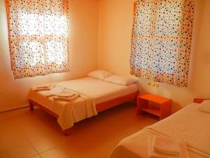 Postel nebo postele na pokoji v ubytování Cirali Irmak Hotel