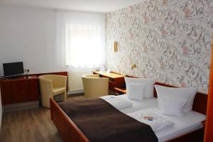 TV a/nebo společenská místnost v ubytování Landhotel zum Böhm