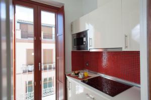 Kuchyňa alebo kuchynka v ubytovaní Apartamento Puerta del Arenal - Kainga Homes