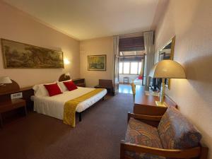 Postel nebo postele na pokoji v ubytování Hotel New Genziana