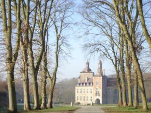 an old building with trees in front of it at Domaine Mielmont in Mazy