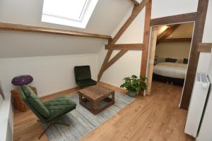 Posezení v ubytování B&B 't Burreken