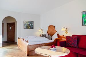 מיטה או מיטות בחדר ב-MONS suites wine passion