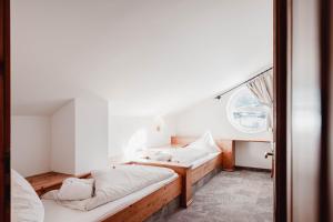 Letto o letti in una camera di MONS suites wine passion