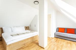 Postel nebo postele na pokoji v ubytování U Pivovaru - Apartments Boží Dar