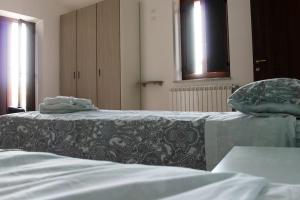 Postel nebo postele na pokoji v ubytování Albergo Diffuso di Campolattaro