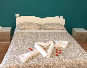 Postel nebo postele na pokoji v ubytování Albergo Diffuso di Campolattaro