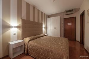 Voodi või voodid majutusasutuse Albergo Bagner toas