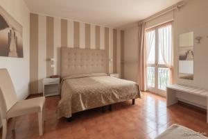 Voodi või voodid majutusasutuse Albergo Bagner toas