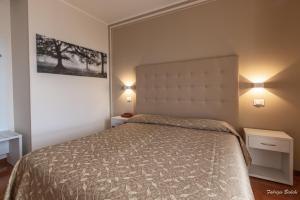 Voodi või voodid majutusasutuse Albergo Bagner toas