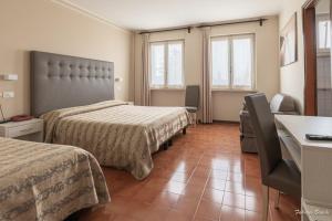 Voodi või voodid majutusasutuse Albergo Bagner toas