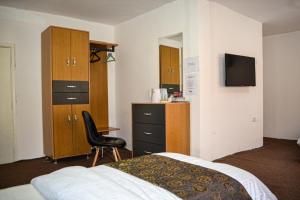 Postel nebo postele na pokoji v ubytování Hikaya studios