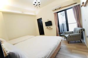 Llit o llits en una habitació de It's Mine Hostel