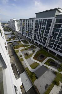 an aerial view of a city with tall buildings at 3BR Jazz Suites Vivacity Megamall Kuching Sarawak in Kuching