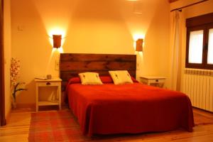 A bed or beds in a room at La Casa de la Estación