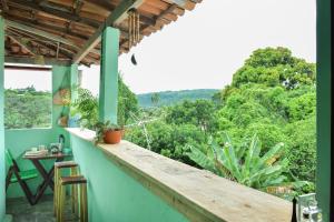 En balkong eller terrasse på Casa da Mineira Hospedaria