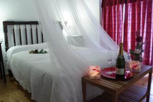 A bed or beds in a room at La Casa de la Estación