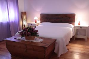 A bed or beds in a room at La Casa de la Estación