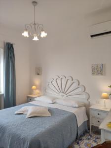 Katil atau katil-katil dalam bilik di B&B Villa Cristina