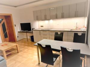 Kuchyň nebo kuchyňský kout v ubytování Apartments Peter