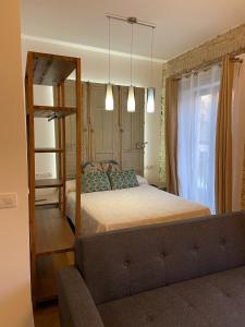A bed or beds in a room at CASA NAIA Santa Rufina 7