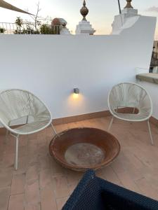 A seating area at CASA NAIA Santa Rufina 7