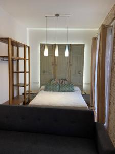 A bed or beds in a room at CASA NAIA Santa Rufina 7