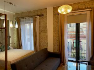 A bed or beds in a room at CASA NAIA Santa Rufina 7