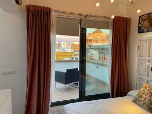 A bed or beds in a room at CASA NAIA Santa Rufina 7
