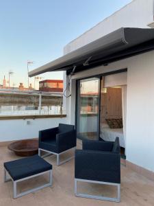 A seating area at CASA NAIA Santa Rufina 7