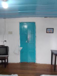 TV a/nebo společenská místnost v ubytování Hostal Familiar Jerico