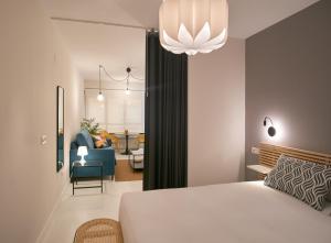 A bed or beds in a room at Apartamentos Los Arroyos