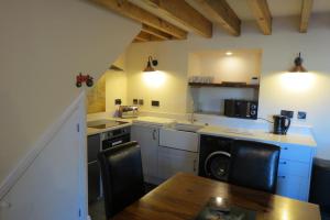 Köök või kööginurk majutusasutuses Farthing Cottage