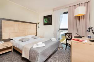 Кровать или кровати в номере Hotel nad Wisłą