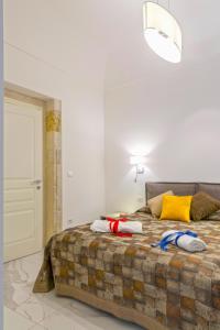 Voodi või voodid majutusasutuse Corinzia Casa Vacanze toas