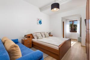 Postel nebo postele na pokoji v ubytování Guest House Dešković