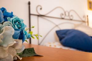 Postel nebo postele na pokoji v ubytování Appartamento di Elizabeth