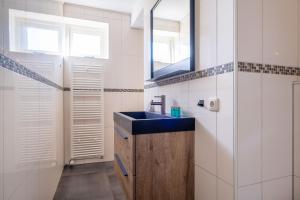 Vonios kambarys apgyvendinimo įstaigoje Bed & Breakfast Yn 'e Haven