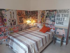 Una cama o camas en una habitación de Apartamento em Lençóis Serrano 101