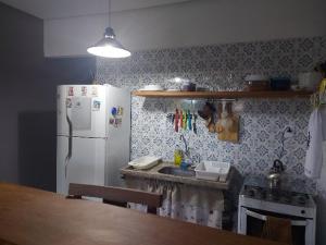Una cocina o cocineta en Apartamento em Lençóis Serrano 101