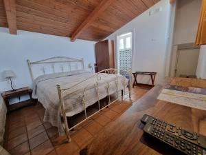 Tempat tidur dalam kamar di Torretta ai Sassi