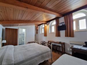 Tempat tidur dalam kamar di Torretta ai Sassi