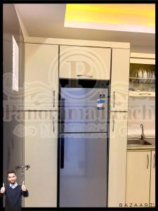 A kitchen or kitchenette at شقق بانوراما شاطئ الأسكندرية كود 9 Még 19 kép