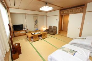 Hotel Mielparque Kumamoto tesisinde bir televizyon ve/veya eğlence merkezi