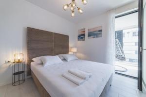Posteľ alebo postele v izbe v ubytovaní Perla Luxury Apartment