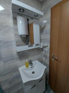 Ένα μπάνιο στο Ekskluziv apartmani