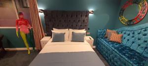 Letto o letti in una camera di The Gate Hotel