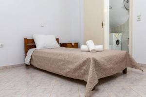 Ένα ή περισσότερα κρεβάτια σε δωμάτιο στο Eleni's house