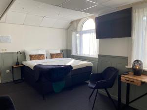 Postel nebo postele na pokoji v ubytování Hotel Beatrix
